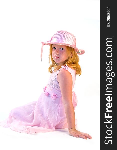 Little girl is wearing a pink dress. Little girl is wearing a pink dress