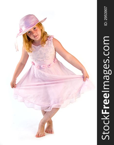 Little lady standing in a pink dress. Little lady standing in a pink dress