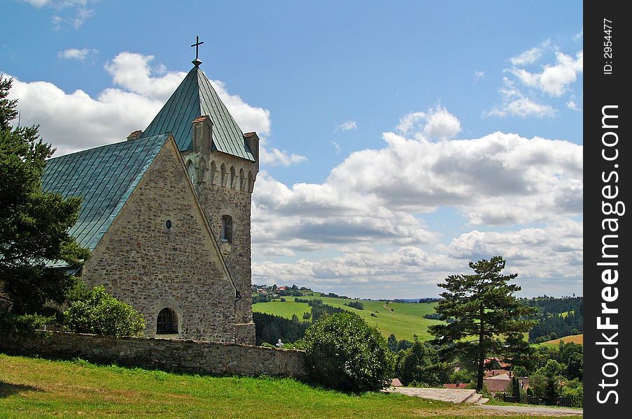 Scenic view of Vitochov village church or chapel with countryside background; Hradec Kralove, Czech Republic. Scenic view of Vitochov village church or chapel with countryside background; Hradec Kralove, Czech Republic.