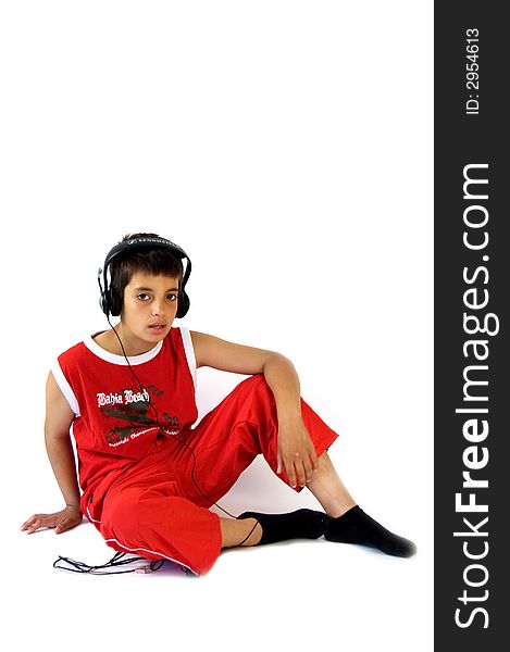 Young boy is wearing a headset and listen. Young boy is wearing a headset and listen