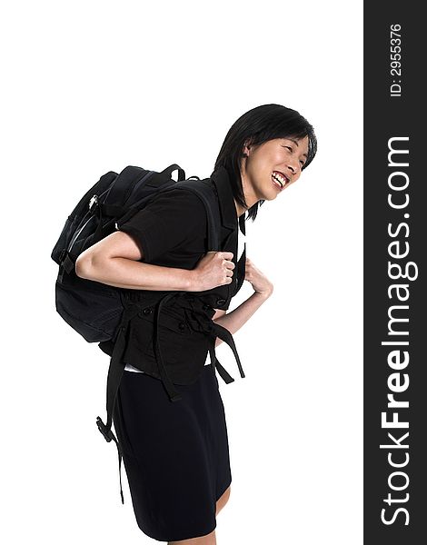 Young woman carrying back-pack over white background