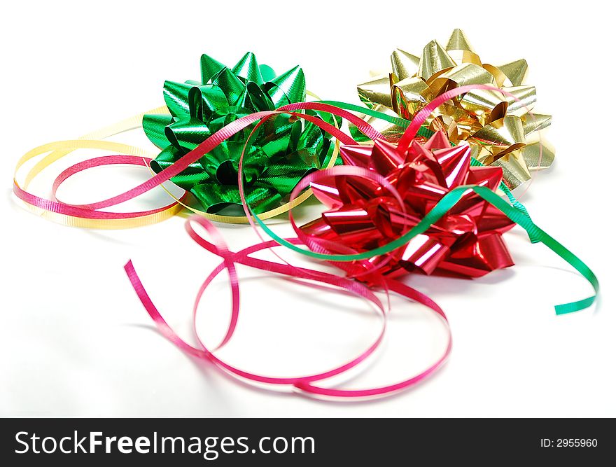 Festive ribbons and bows as used in wrapping gifts for holiday or birthday