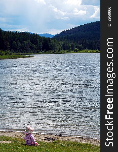 Child enjoying lakeview in British Columbia ,Canada. Child enjoying lakeview in British Columbia ,Canada.