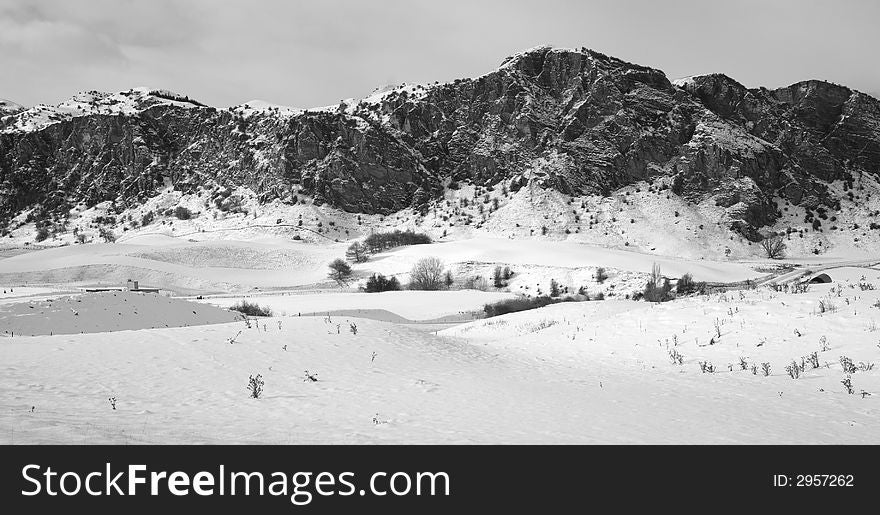 Monochrome image of Mountain range covered in snow near Queenstown, New Zealand. Monochrome image of Mountain range covered in snow near Queenstown, New Zealand