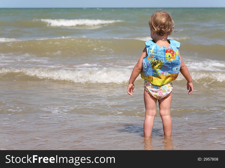 Little Girl Comes Into Water