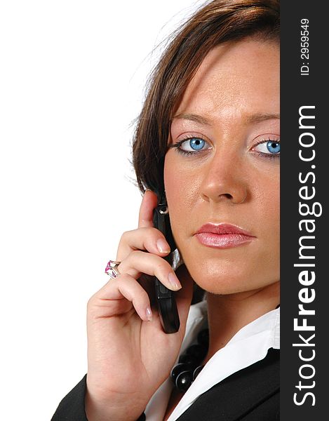 Businesswoman on the cell phone against a white background