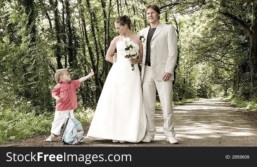 Pictures shooten on a wedding day from a beauty couple and child. Pictures shooten on a wedding day from a beauty couple and child