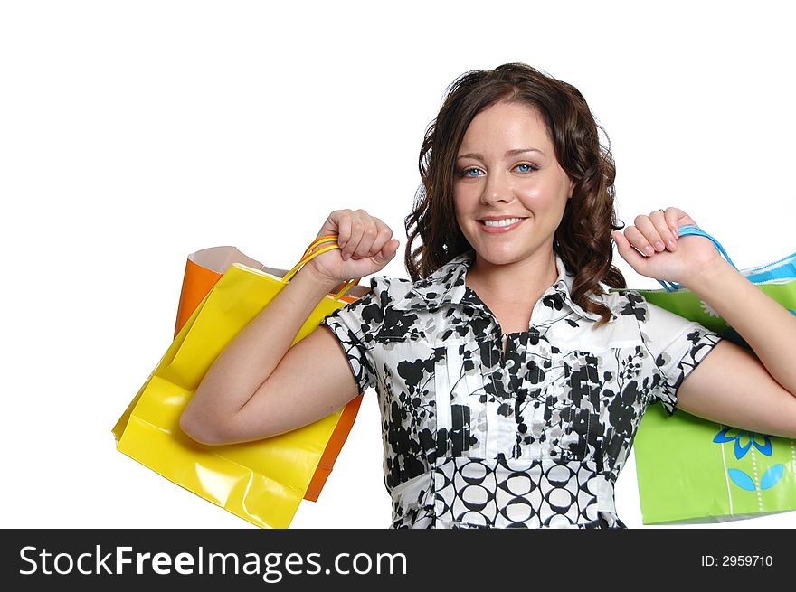 Beautiful girl with shopping bags on white background. Beautiful girl with shopping bags on white background