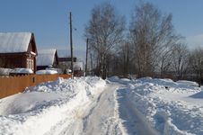 Snowy Road In The Village Royalty Free Stock Photos Snowy Road In The Village Royalty Free Stock Photos