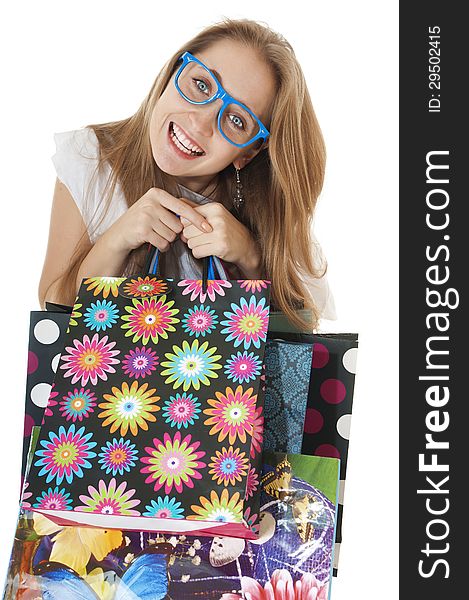 Crazy Funny Young Girl With Shopping Gift Bags Wearing Glasses.