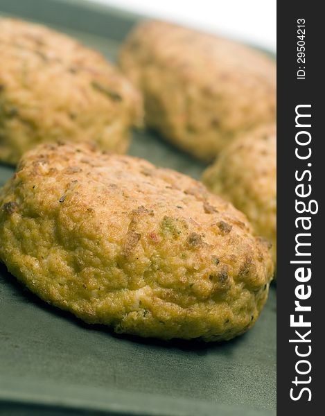 Lobster cakes on baking pan