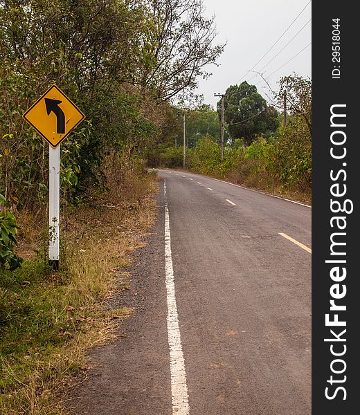 Yellow Traffic Sign, Turn Left.