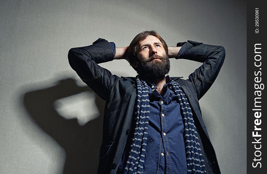 Portrait of the young man with a big beard and mustaches