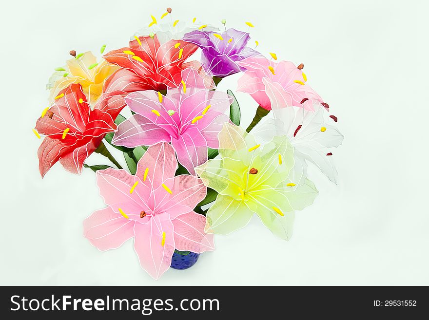 LILY ARTIFICIAL FLOWERS ISOLATED ON WHITE