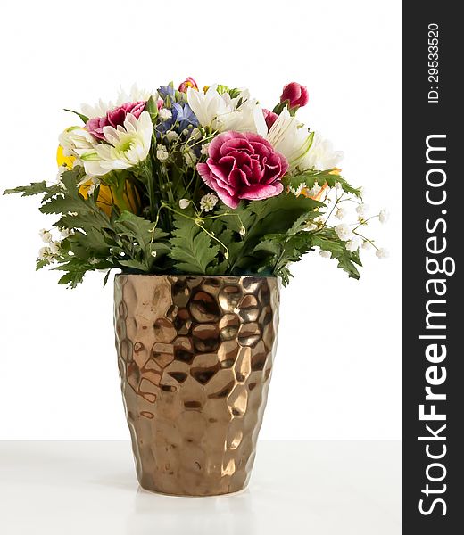 Flowers in a vase on white background. Flowers in a vase on white background.