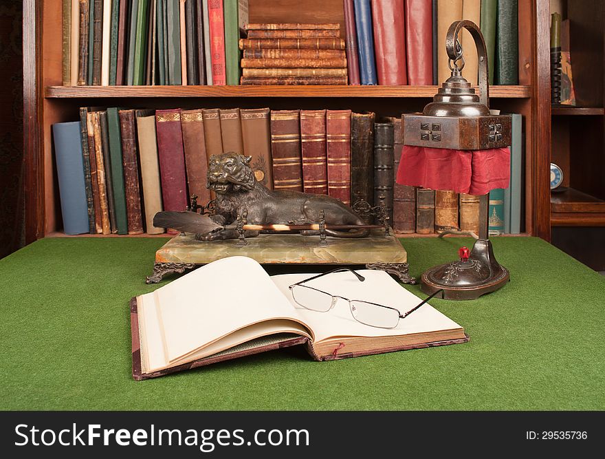 Antique Leather Books, Lamp, Inkwell And Reading Glasses