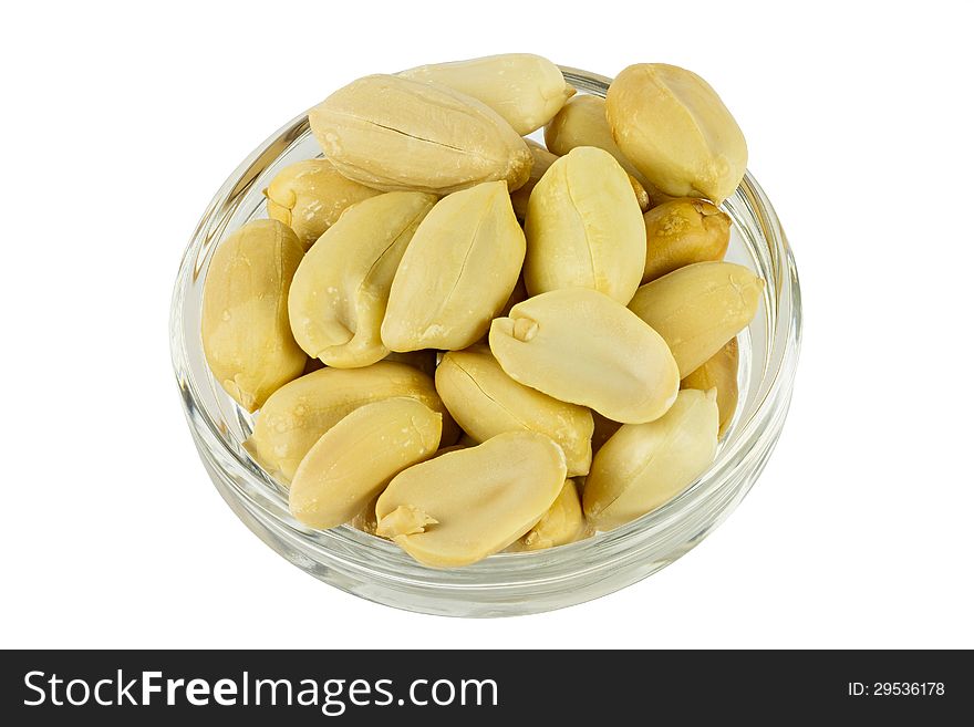 Peanuts in glass plate isolated on white background
