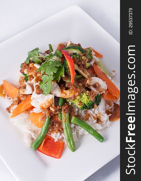 Chicken stir-fry with vegetable and rice asia food