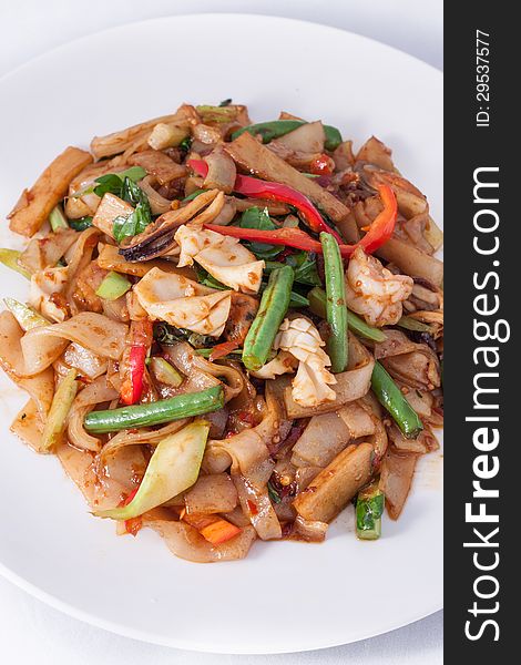 Flat rice noodle stir fried withseafood.