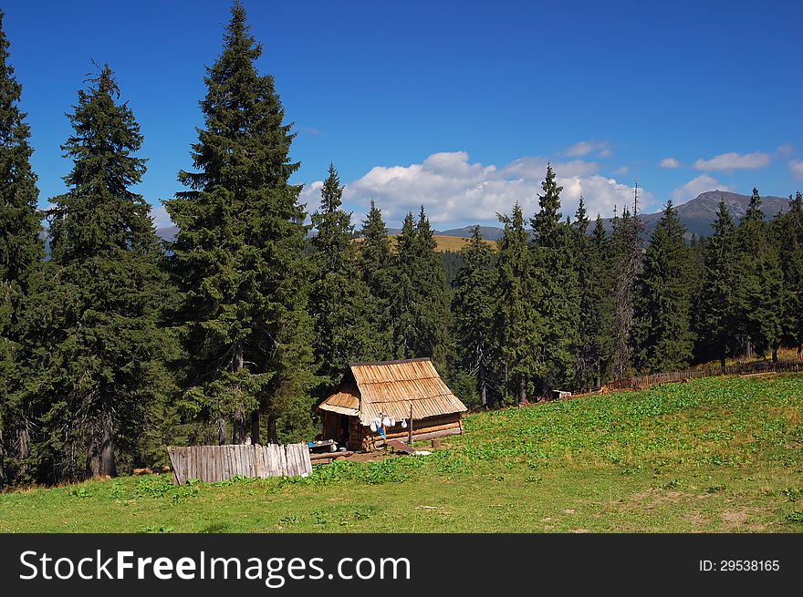 Wooden cottage in the mountains