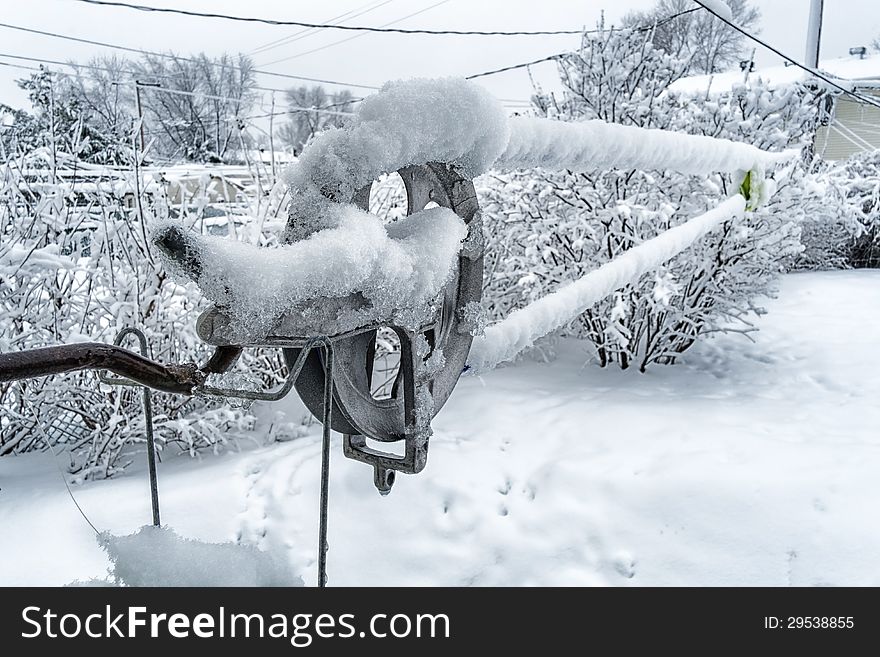 Close up of a clothesline on a snowy day