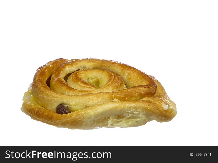 Bun with cream and raisins, isolated on white background