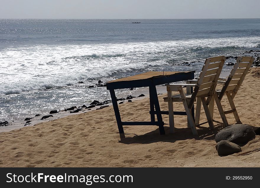 Table and chairs on a beach in Senegal, west africa. Table and chairs on a beach in Senegal, west africa.