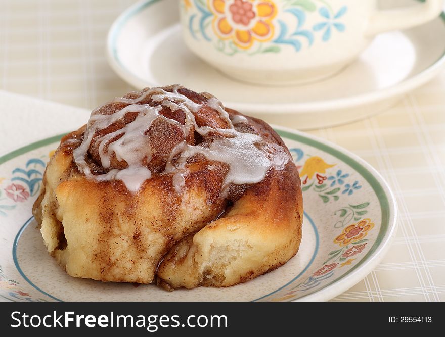 Closeup of a homemade cinnamon roll on a plate