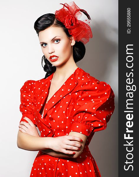 Woman in Red Retro Dress with crossed hands. Proud Female. Woman in Red Retro Dress with crossed hands. Proud Female