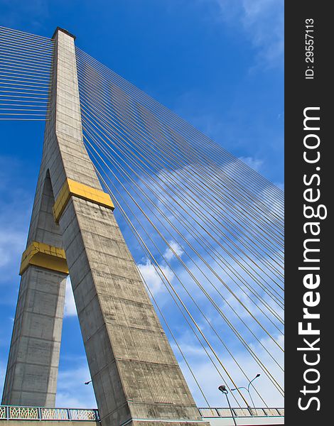 The pole of the cable bridge with blue sky and cloudy. The pole of the cable bridge with blue sky and cloudy