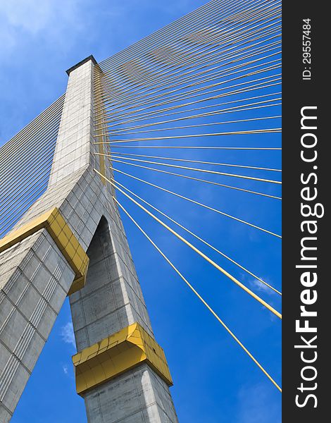 The pole of the cable bridge with blue sky and cloudy. The pole of the cable bridge with blue sky and cloudy