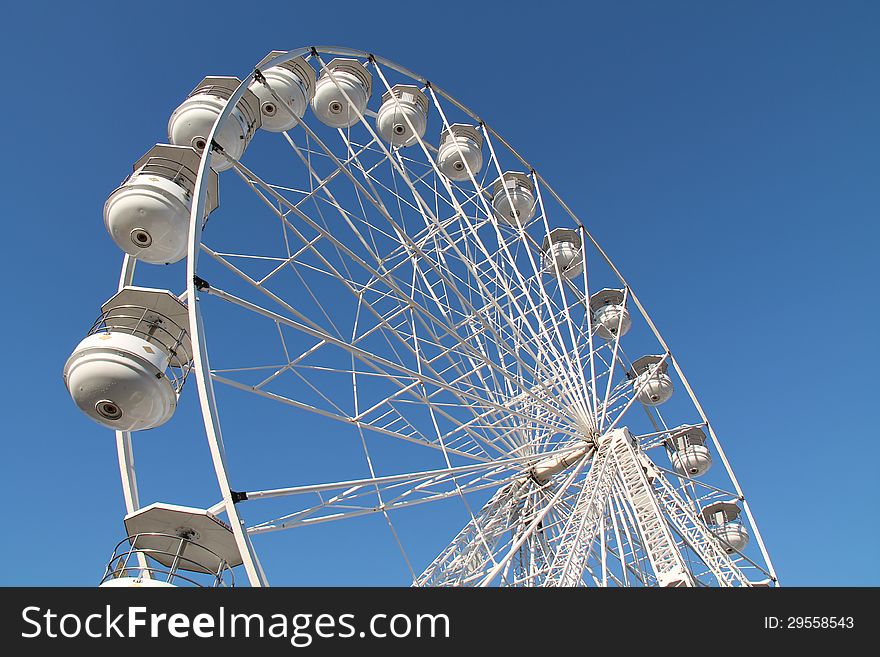 The White Carriages of a Fun Fair Big Wheel Ride.