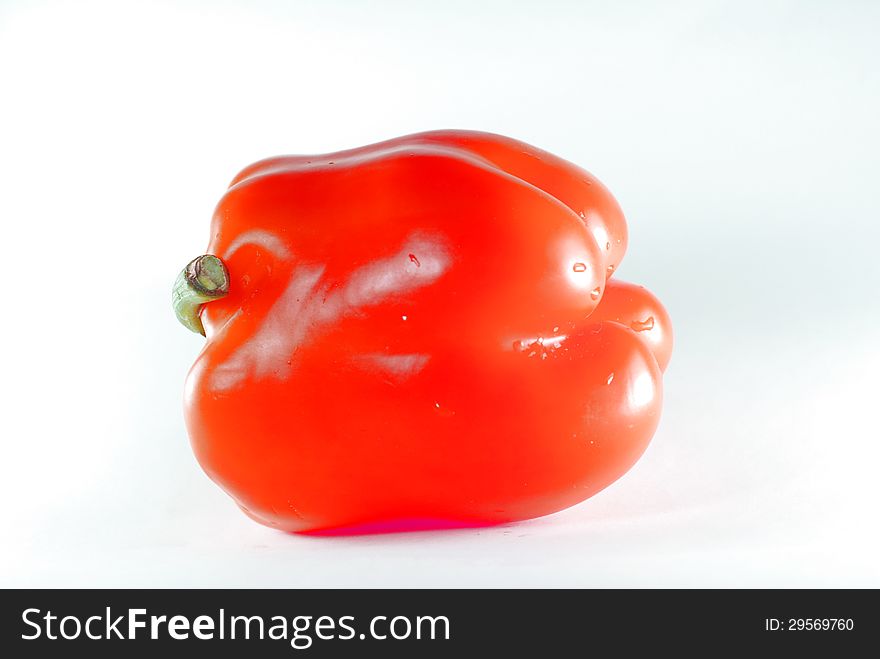 a red sweet pepper and fresh .