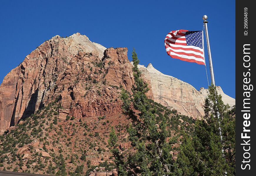 Bryce Canyon City With The Flag Of The United States