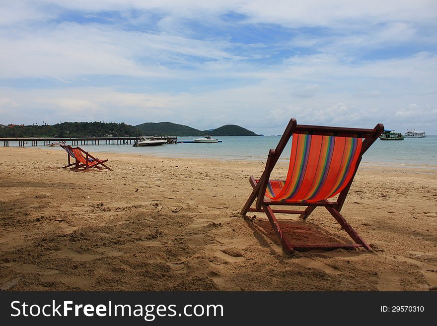 Beach chairs on shore near sea. at koamak. Thailand. Beach chairs on shore near sea. at koamak. Thailand