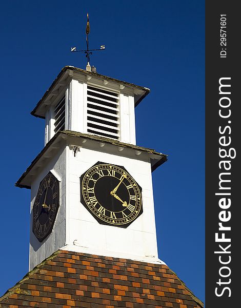Landmark clock tower on a clear sunny day in Steyning, Sussex