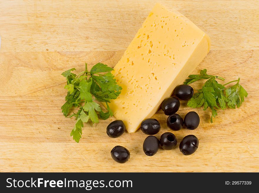 Cheese Served With Black Olives