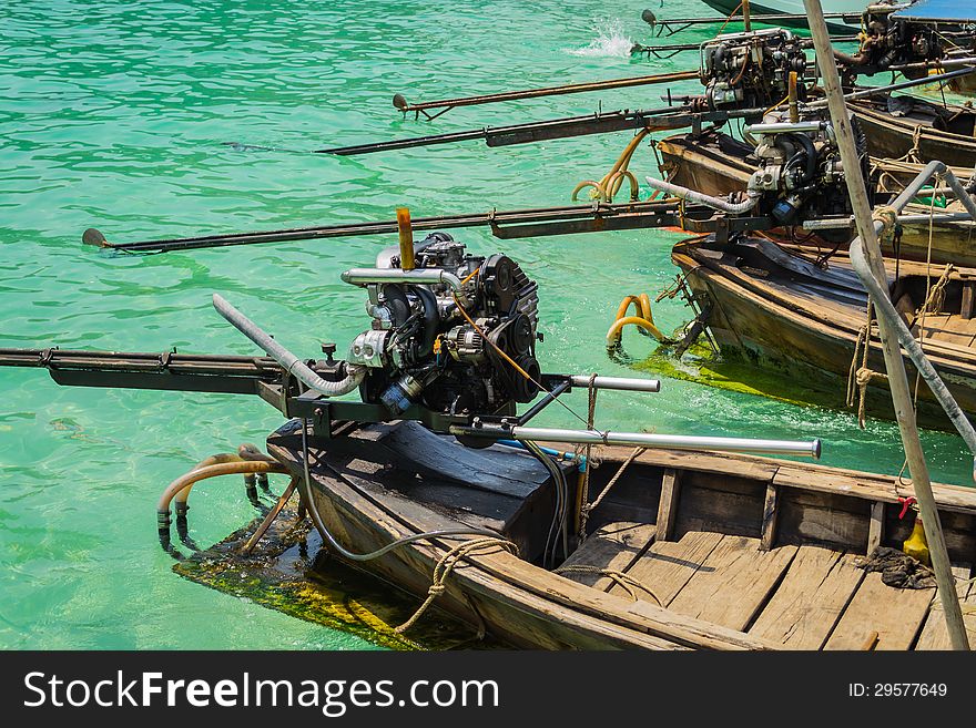 Rear side of wooden long tail boat with engine. Rear side of wooden long tail boat with engine