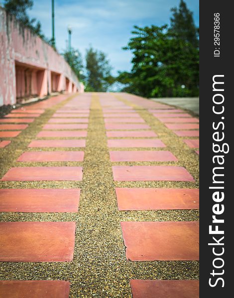 Empty sidewalk on a bridge with blue sky