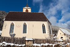 A Wintertime View Of A Small Church With A Tall Steeple Royalty Free Stock Image