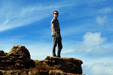 Solitude-Young Man Alone On Mountain Top Royalty Free Stock Image Solitude-Young Man Alone On Mountain Top Royalty Free Stock Image