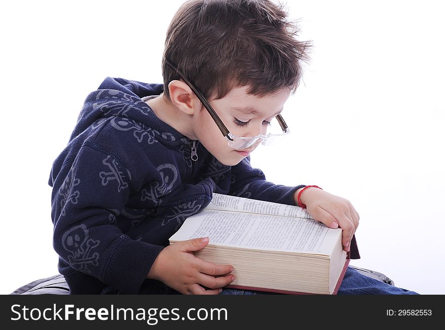 Little Boy Reading A Book