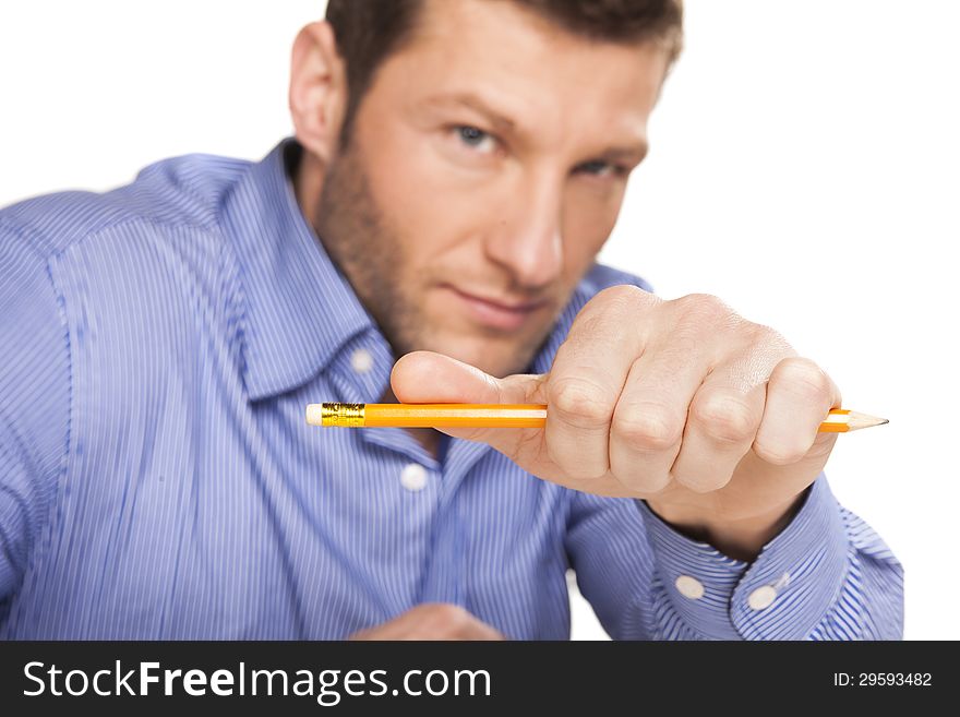 Portrait of a handsome young man with a pen in hand. Portrait of a handsome young man with a pen in hand