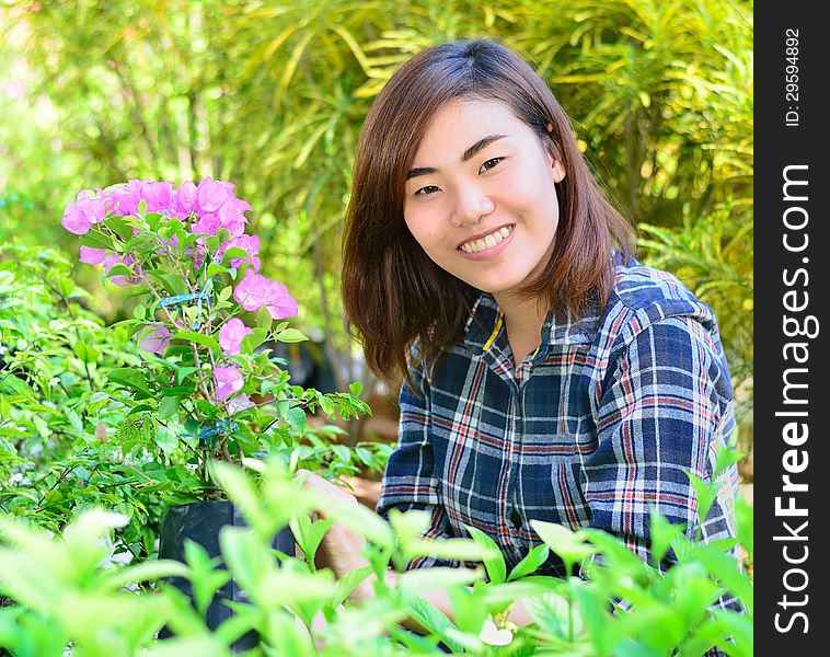 Beautiful Asian Women In Flowers Garden