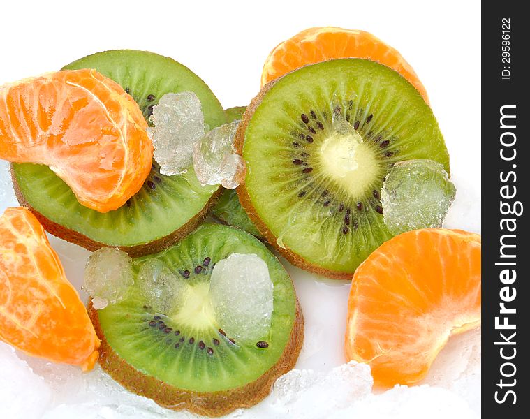Clementine and kiwi slices on crushed ice. Clementine and kiwi slices on crushed ice