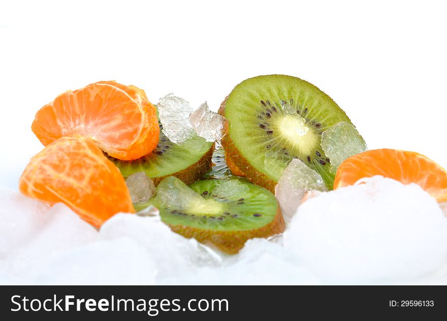 Clementine and kiwi slices on crushed ice. Clementine and kiwi slices on crushed ice