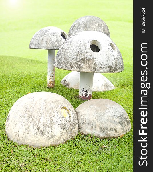 Cement mushroom in a playground. Cement mushroom in a playground.