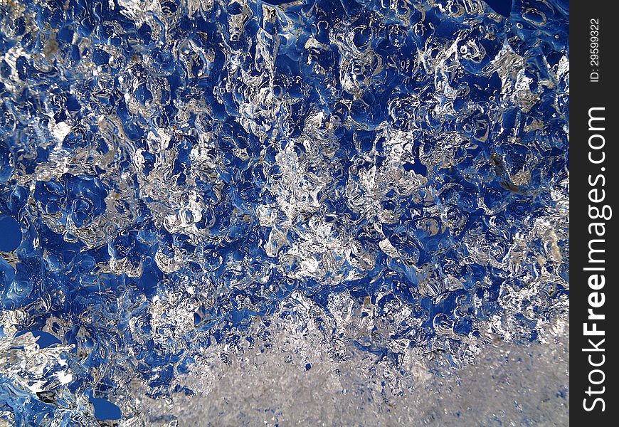 A piece of ice on sky background