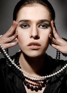 Woman With Beads Stock Image
