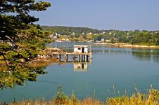 Scenic Fishing Shack And Pier Stock Photography